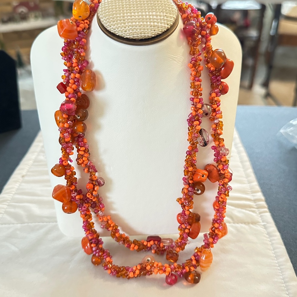 Brightly colored Beaded necklace thick with several types of beads 35”